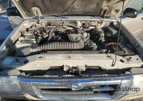 1999 Mazda B4000 Cab Plus from USA, damaged, VIN 4F4ZR17X2XTM34555